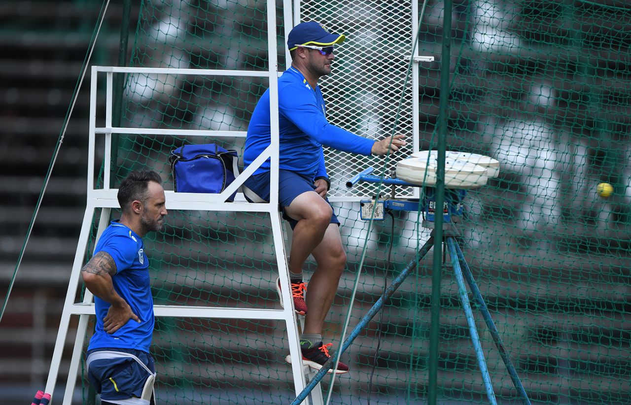 Faf du Plessis watches as Mark Boucher operates the bowling machine, Johannesburg, January 22, 2020