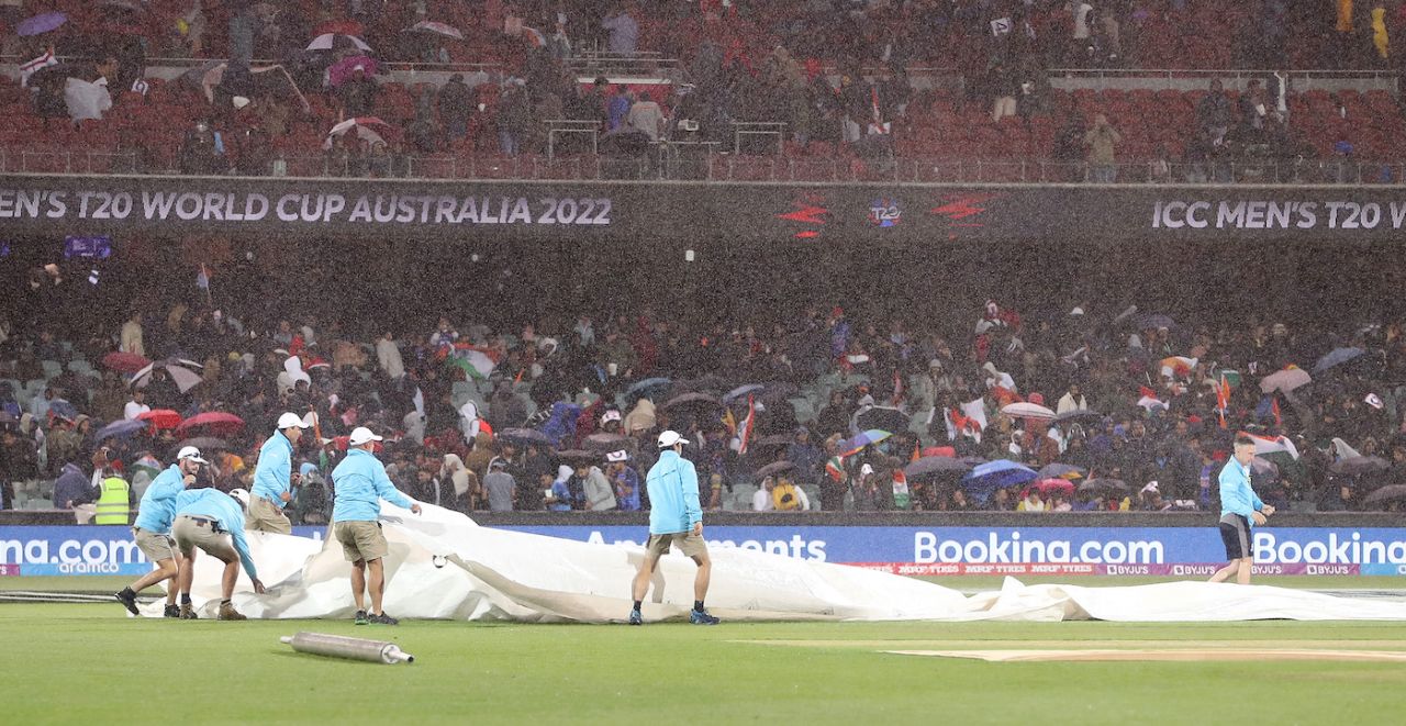 The ground staff put on covers after rain interrupted play, Bangladesh vs India, ICC Men's T20 World Cup 2022, Adelaide, November 2, 2022
