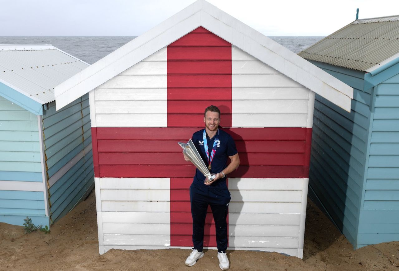 Jos Buttler poses with the T20 World Cup trophy at Brighton Beach the morning after winning the final, Melbourne, November 14, 2022