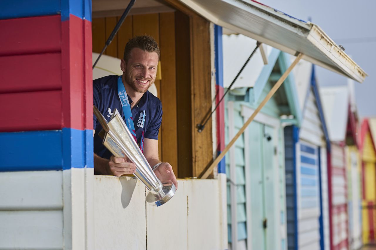 Jos Buttler poses with the T20 World Cup trophy at Brighton Beach, Melbourne, November 14, 2022