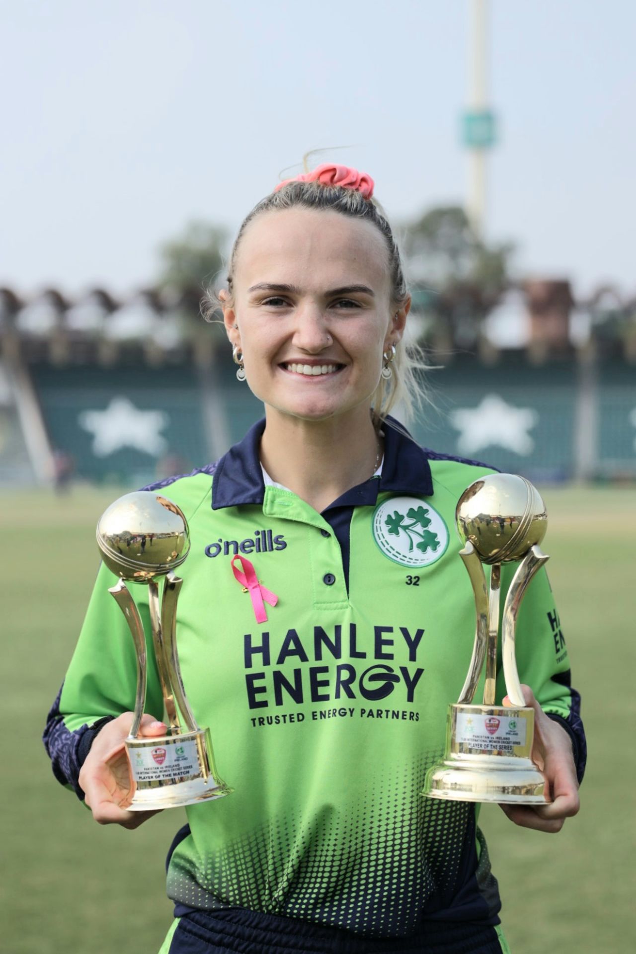 Gaby Lewis poses with the player of the match and player of the series trophies, Pakistan vs Ireland, 3rd women's T20I, Lahore, November 16, 2022