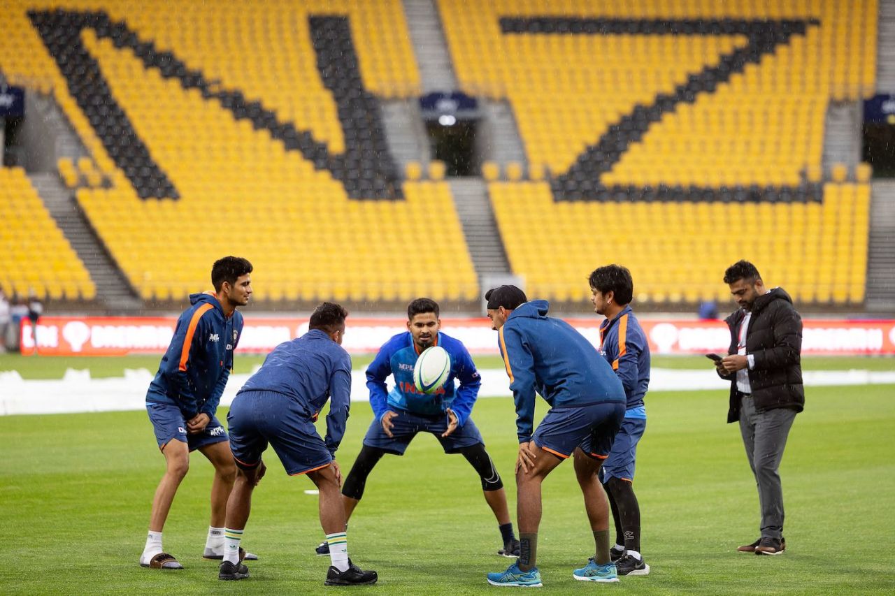 The Indians came out to warm-up with a rugby ball when the rain relented for a bit, New Zealand vs India, 1st T20I, Wellington, November 18, 2022