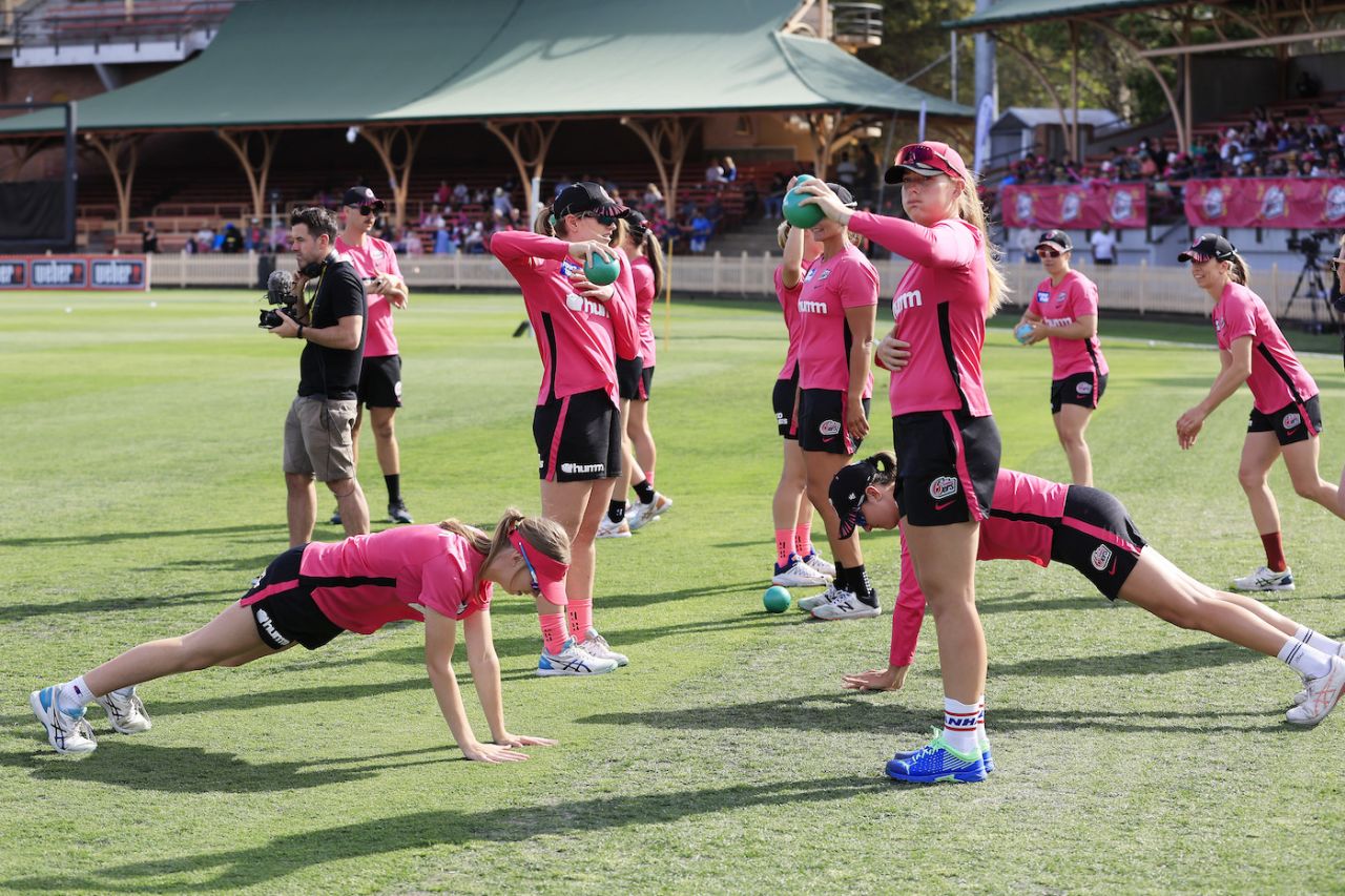 The Sixers players warm up before the final, Adelaide Strikers vs Sydney Sixers, WBBL final, Sydney, November 26, 2022