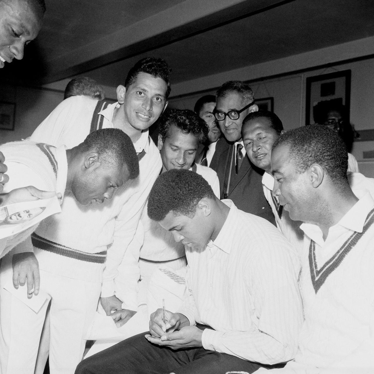 Muhammad Ali signs autographs for the West Indies players in the dressing room, England vs West Indies, Lord's, 1st day, June 16, 1966