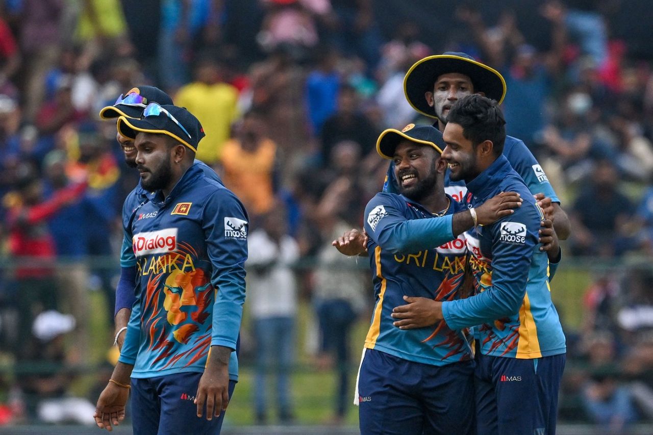 Dhananjaya de Silva is congratulated by teammates after he had Rahmanullah Gurbaz caught at long-off, Sri Lanka vs Afghanistan, 2nd men's ODI, Pallekele, November 27, 2022
