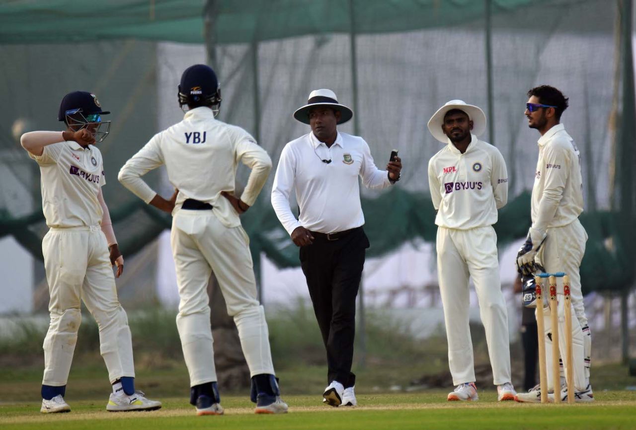The umpire walks with a light-meter reading, Bangladesh A vs India A, 1st unofficial Test, 4th Day, Cox's Bazar, December 02, 2022