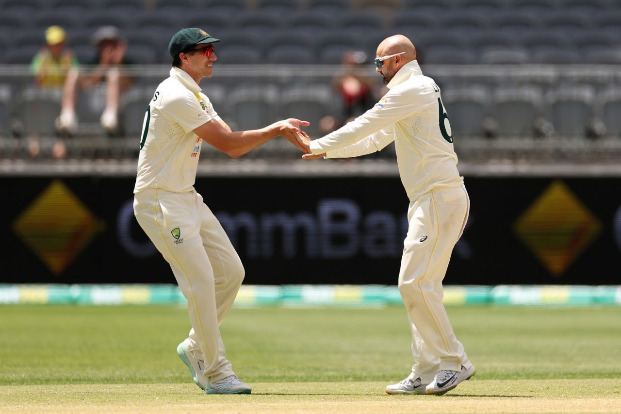 Pat Cummins and Nathan Lyon celebrate the wicket of Kyle Mayers, Australia vs West Indies, 1st Test, Perth, 5th day, December 4, 2022