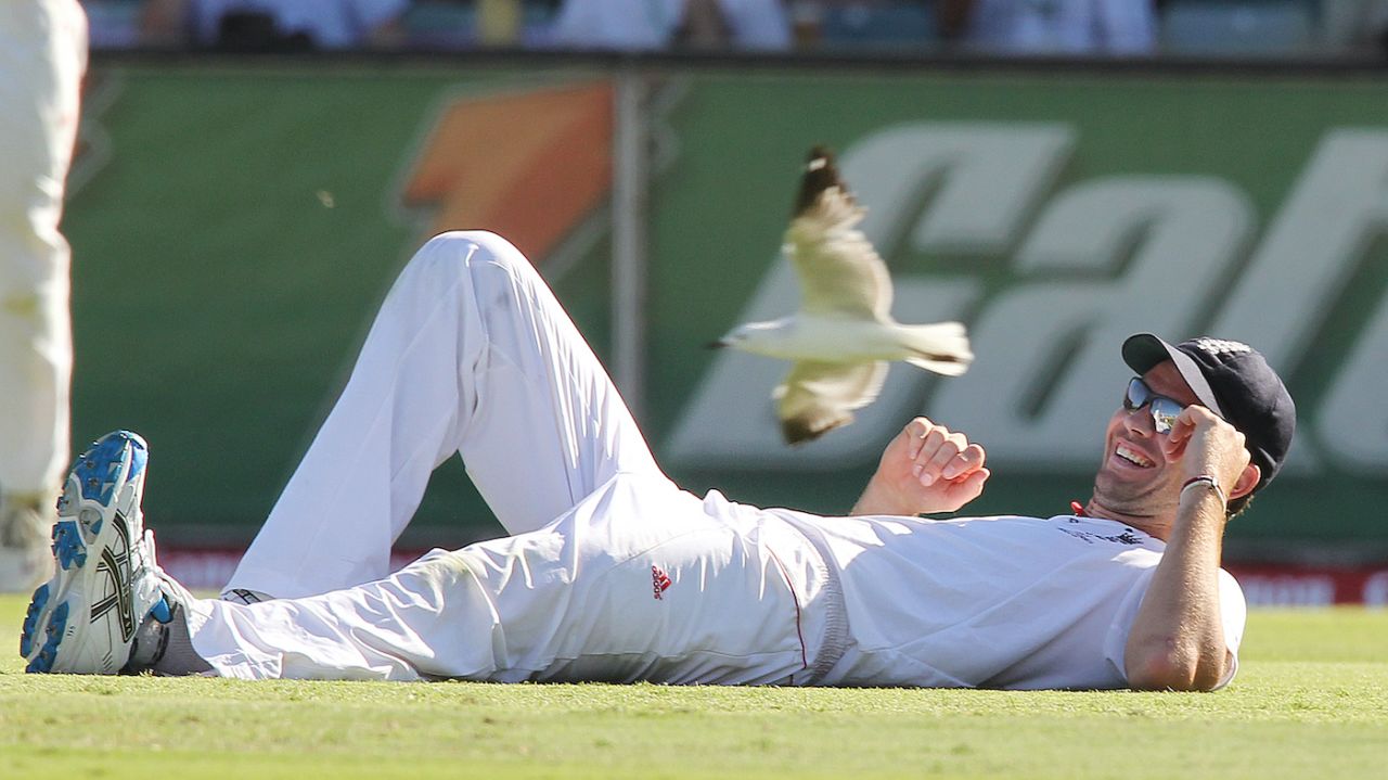 James Anderson lies on the ground after catching Mitchell Johnson, Australia v England, 3rd Test, Perth, 1st day, December 16, 2010