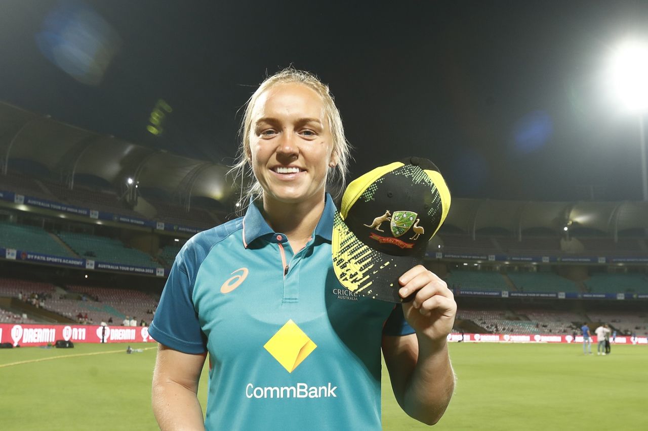 Kim Garth poses with her debut cap, India vs Australia, first Women's T20I, Mumbai, December 9, 2022