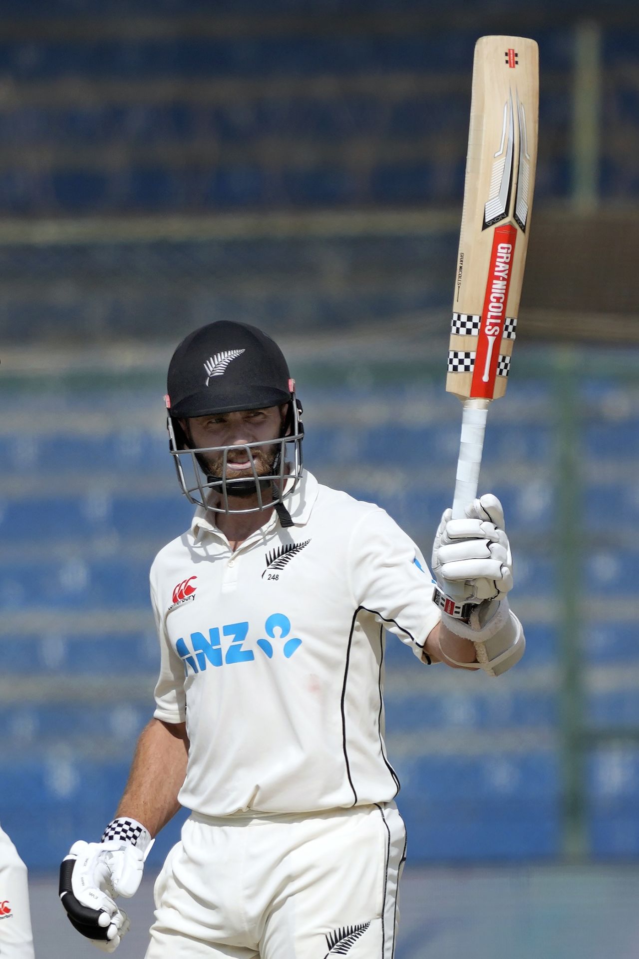Kane Williamson raises his bat after reaching 150, 1st Test, Karachi, 4th day, December 29, 2022
