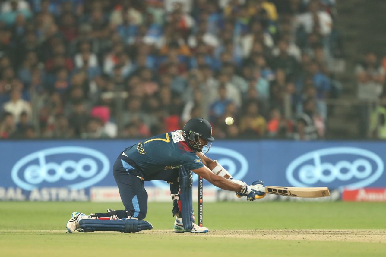 Dasun Shanaka shapes to scoop one away, India vs Sri Lanka, 2nd T20I, Pune, January 5, 2023