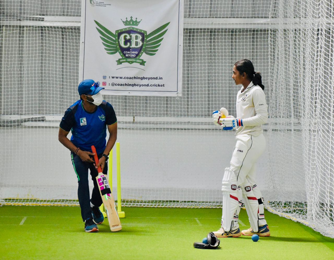 Coach R Sridhar gives batting tips to G Trisha
