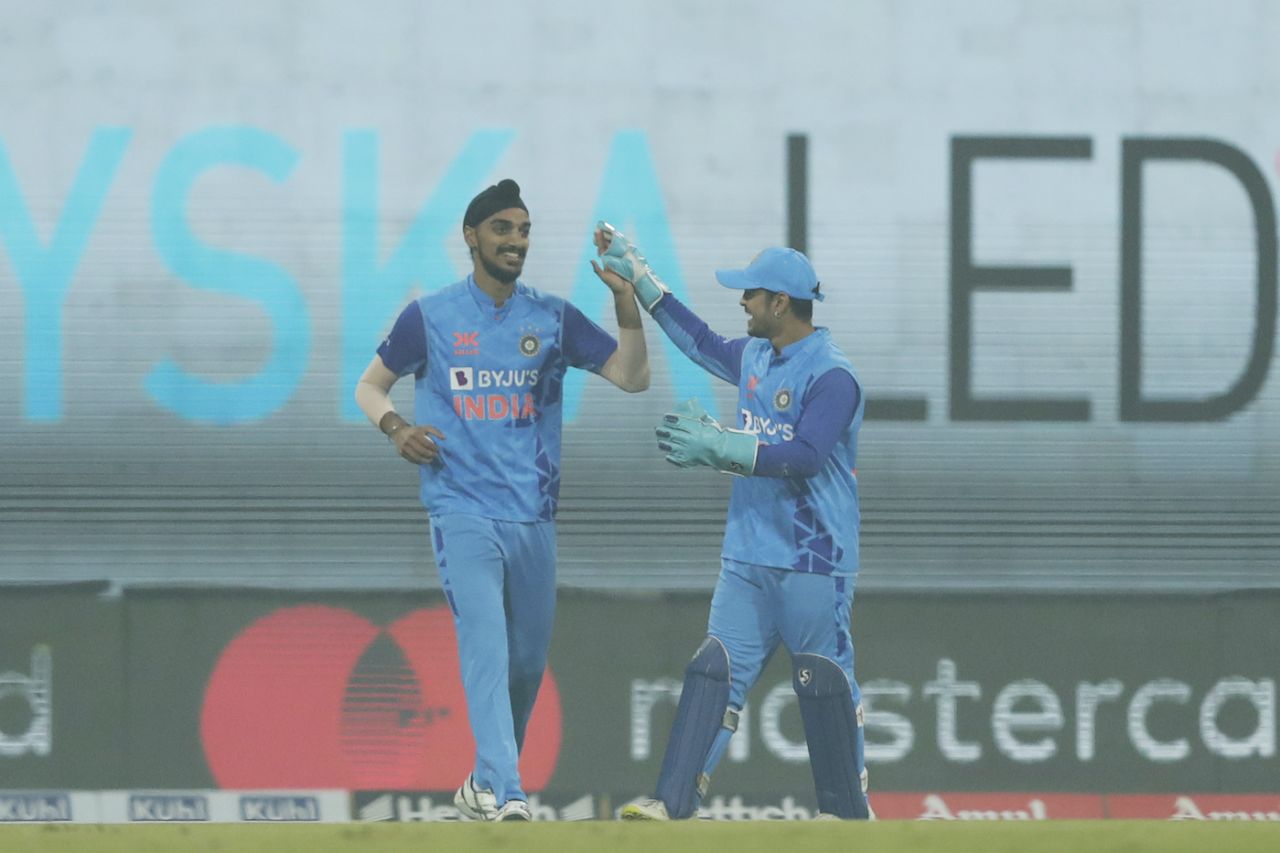 Ishan Kishan celebrates with Arshdeep Singh, who was among the wickets, India vs New Zealand, 2nd T20I, Lucknow, January 29, 2023