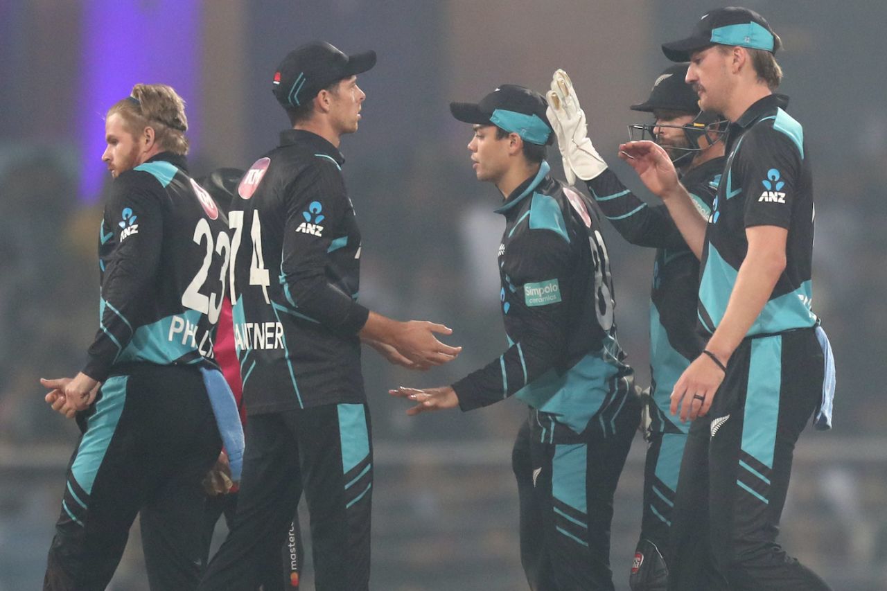 Mitchell Santner and Mark Chapman celebrate with team-mates, India vs New Zealand, 2nd T20I, Lucknow, January 29, 2023