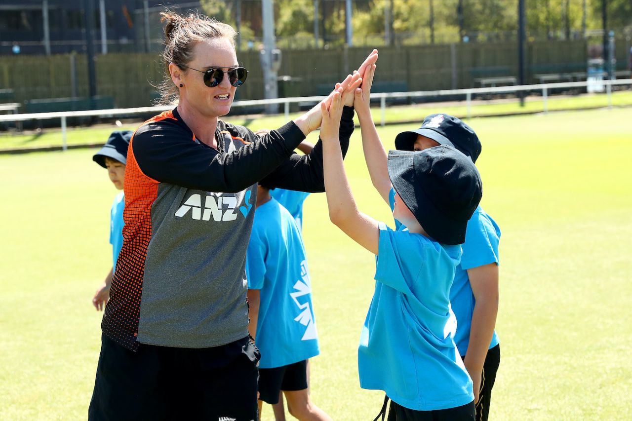 Hayley Jensen high-fives a kid, February 28, 2020