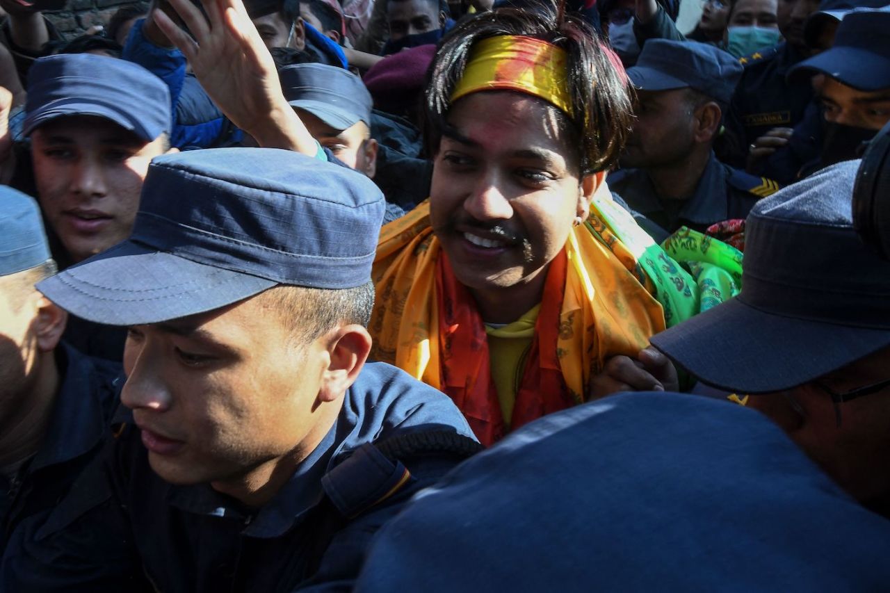 Sandeep Lamichhane is escorted by police following his release on bail, Kathmandu, January 13, 2023