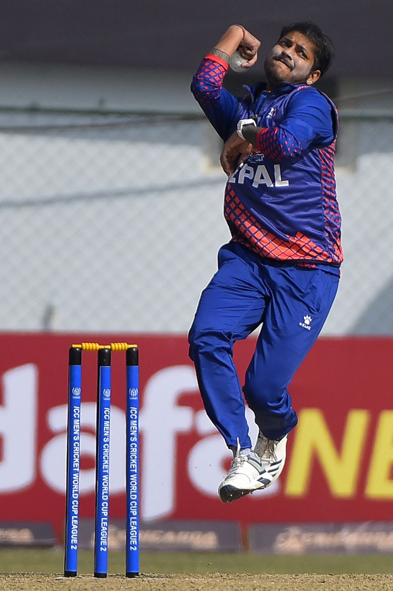 Sandeep Lamichchane in his delivery stride, Nepal vs Namibia, World Cup League 2, Kathmandu, February 14, 2023