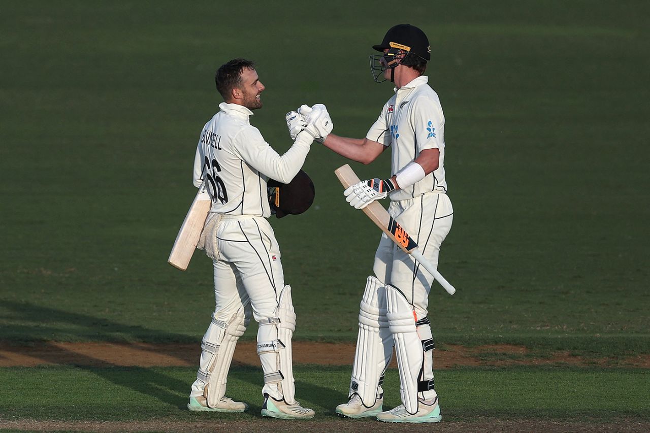 Tom Blundell celebrates his hundred with Blair Tickner, New Zealand v England, 1st Test, Mount Maunganui, 2nd day, February 17, 2023