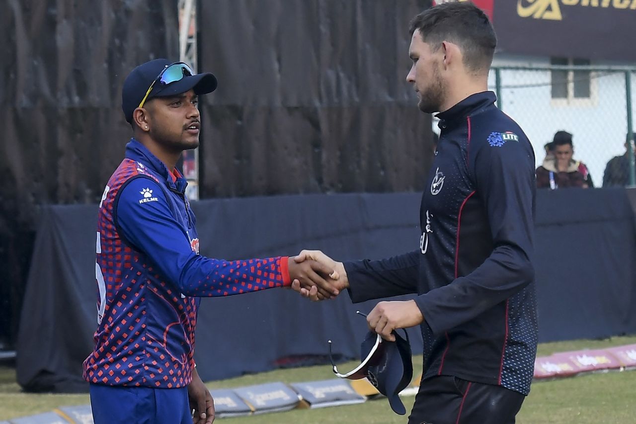 Sandeep Lamichhane shakes his hand with Gerhard Erasmus of Namibia, Nepal vs Scotland, ICC Men's Cricket World Cup League 2, Kirtipur, February 18, 2023