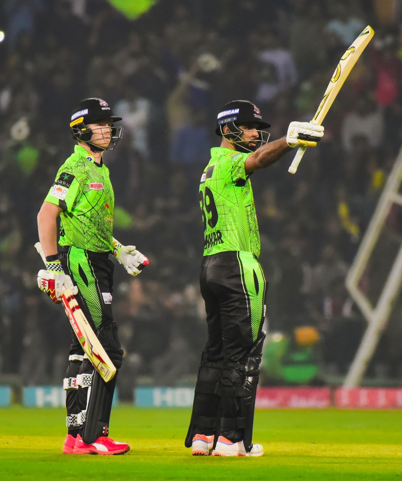 Fakhar Zaman raises his bat after reaching his fifty, Lahore Qalandars vs Peshawar Zalmi, Lahore, PSL, February 26, 2023