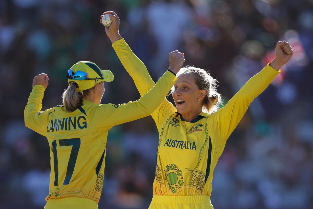 Ashleigh Gardner celebrates with Meg Lanning after Australia's win