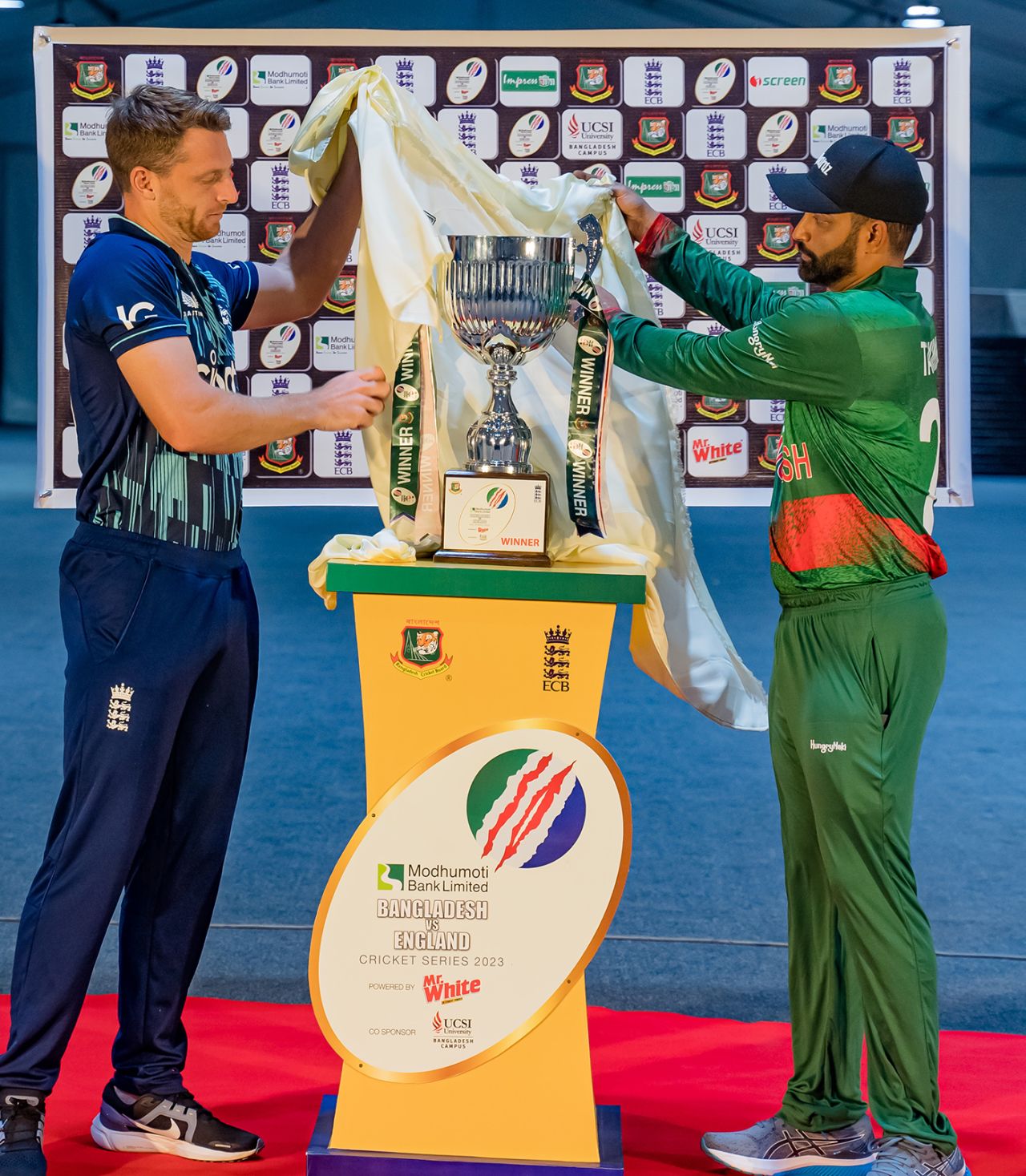 Jos Buttler and Tamim Iqbal with the ODI series trophy, Dhaka, Bangladesh vs England, February 28, 2023