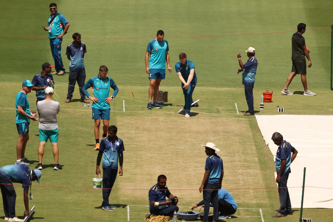 The Australians crowd around the pitch a day away from the Test, India vs Australia, 4th Test, Ahmedabad, March 8, 2023