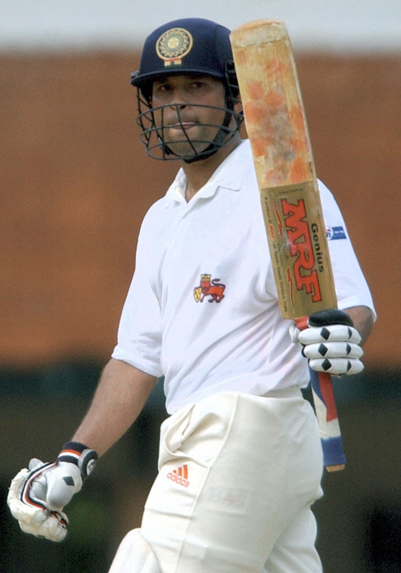 Sachin Tendulkar raises his bat after reaching 50, Mumbai v Rest of India, Irani Trophy, Chennai, September 18, 2003