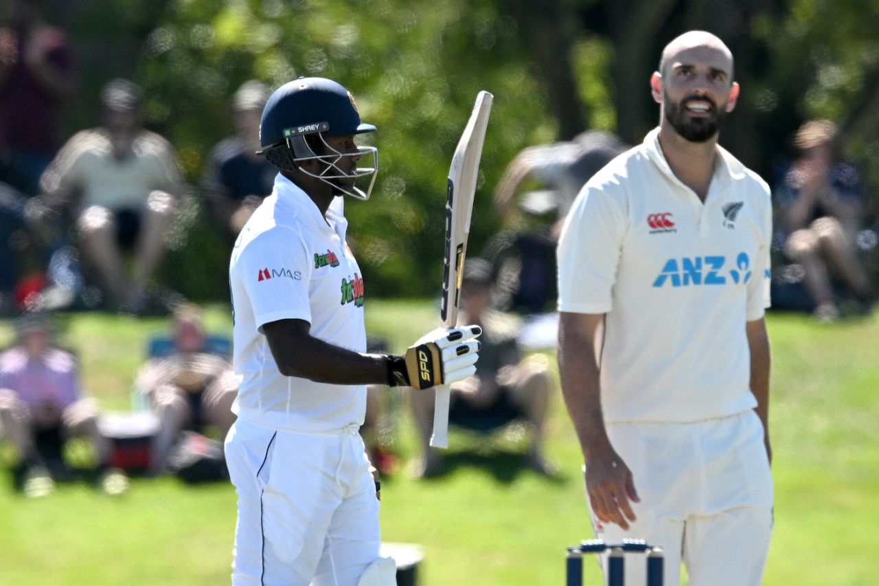 Angelo Mathews raises his bat as Daryl Mitchell walks back, New Zealand vs Sri Lanka, 1st Test, Christchurch, 4th day, March 12, 2023