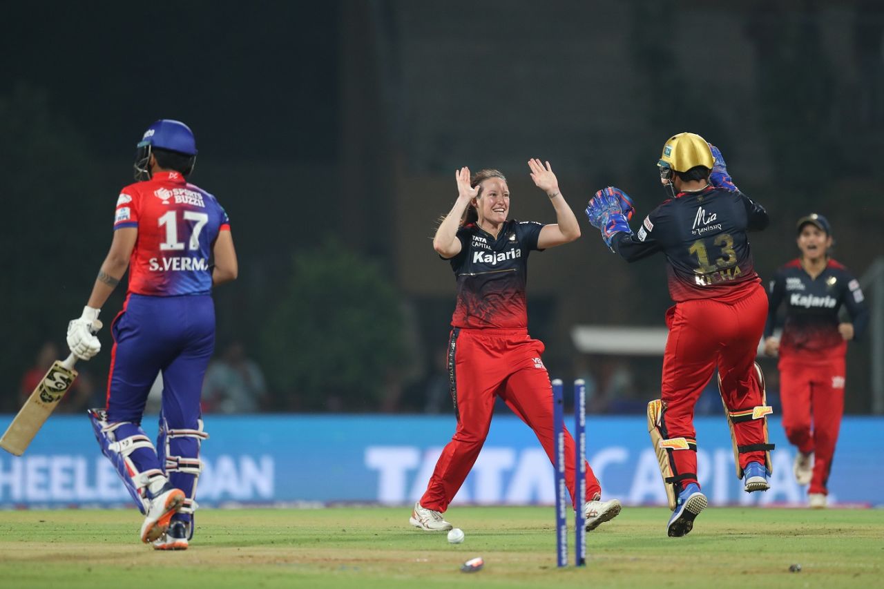 Megan Schutt celebrates with Richa Ghosh the dismissal of Shafali Verma, Delhi Capitals vs Royal Challengers Bangalore, WPL, Navi Mumbai, March 13, 2023
