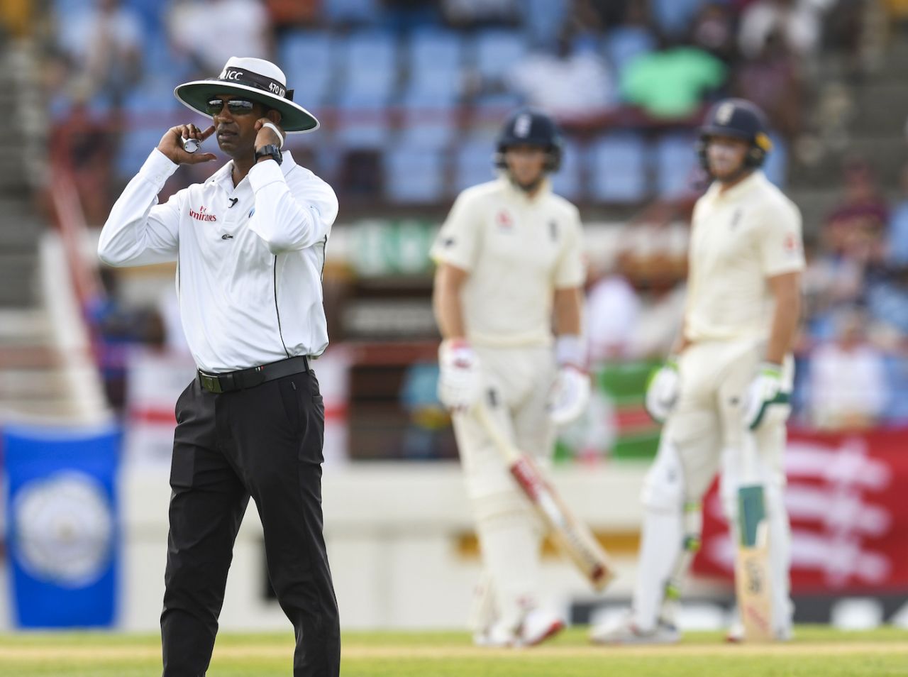 Kumar Dharmasena signals that he can't hear the TV umpire, West Indies v England, 3rd Test, Gros Islet, 3rd day, February 11, 2019