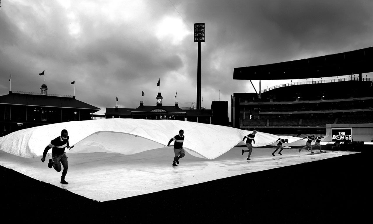 Runner-up in the Wisden Cricket Photograph of the Year 2022 competition, groundstaff remove covers, Fourth Ashes Test, Australia vs England, SCG, January 6, 2022