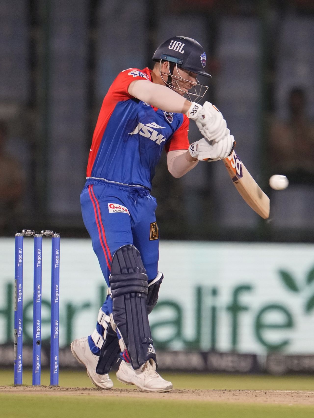 David Warner crunches one through covers, Delhi Capitals v Mumbai Indians, IPL 2023, Delhi, April 11, 2023