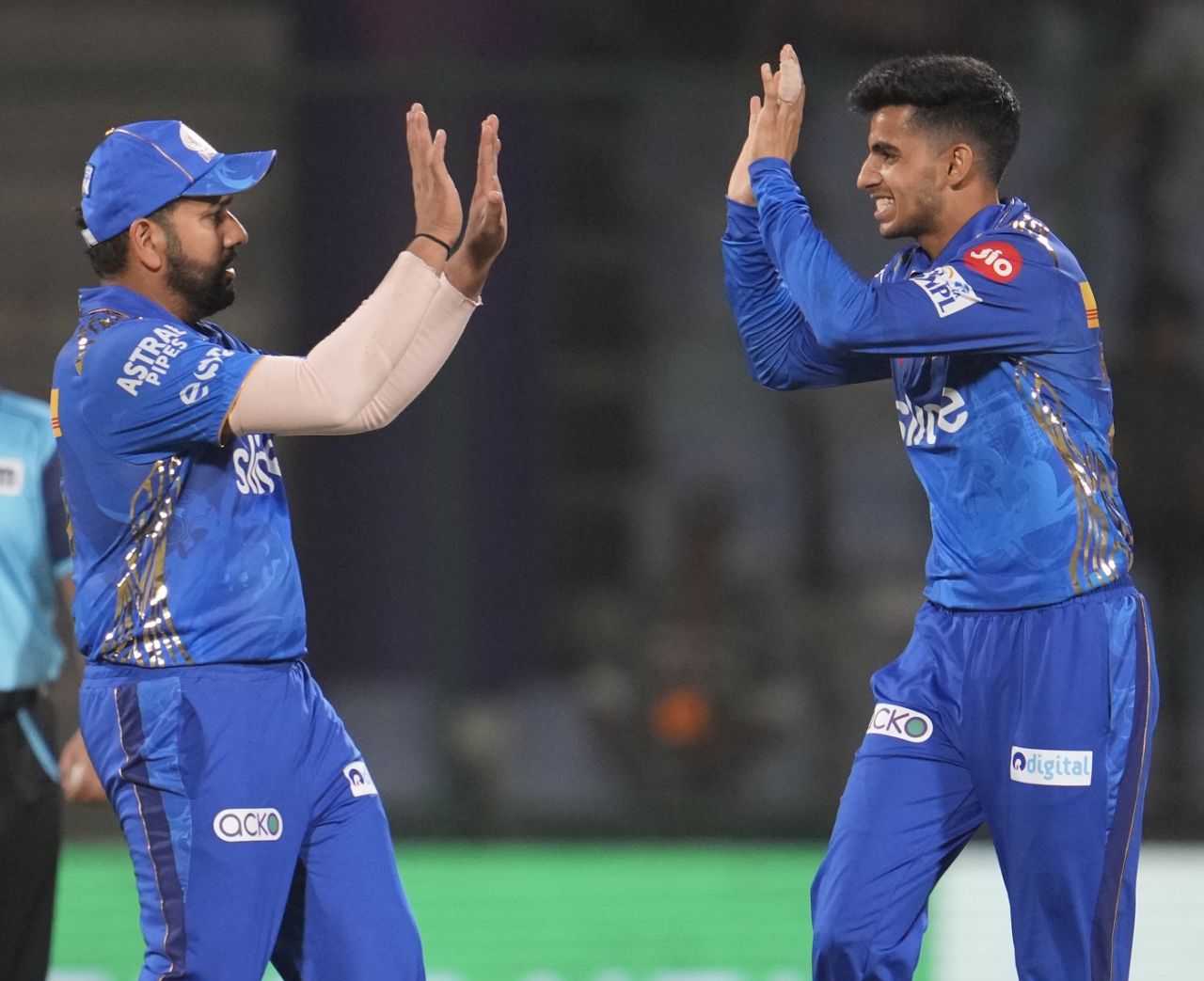 Hrithik Shokeen and Rohit Sharma celebrate Prithvi Shaw's dismissal, Delhi Capitals v Mumbai Indians, IPL 2023, Delhi, April 11, 2023