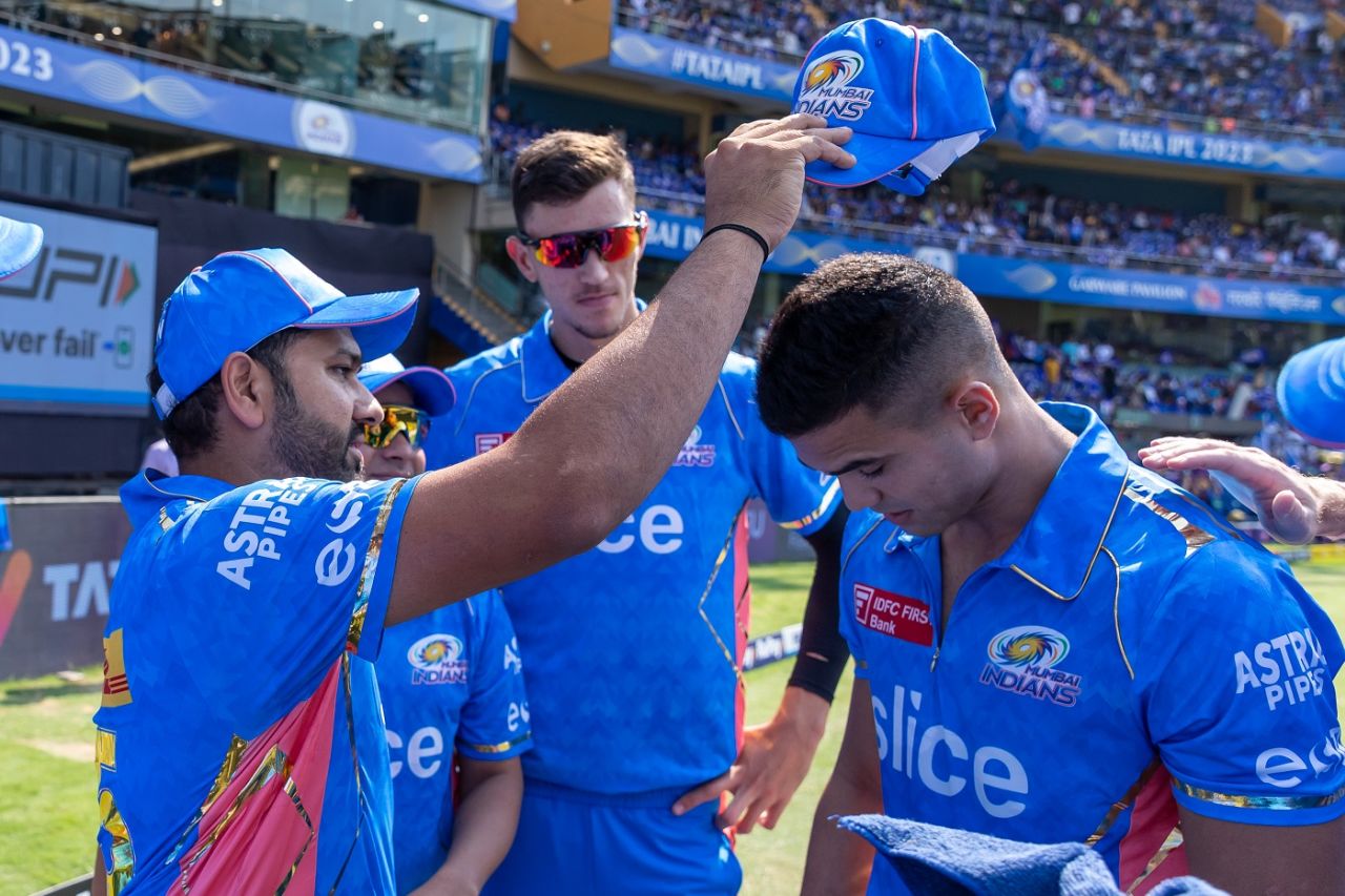 Arjun Tendulkar gets his cap from Rohit Sharma, Mumbai Indians vs Kolkata Knight Riders, IPL 2023, Mumbai, April 16, 2023