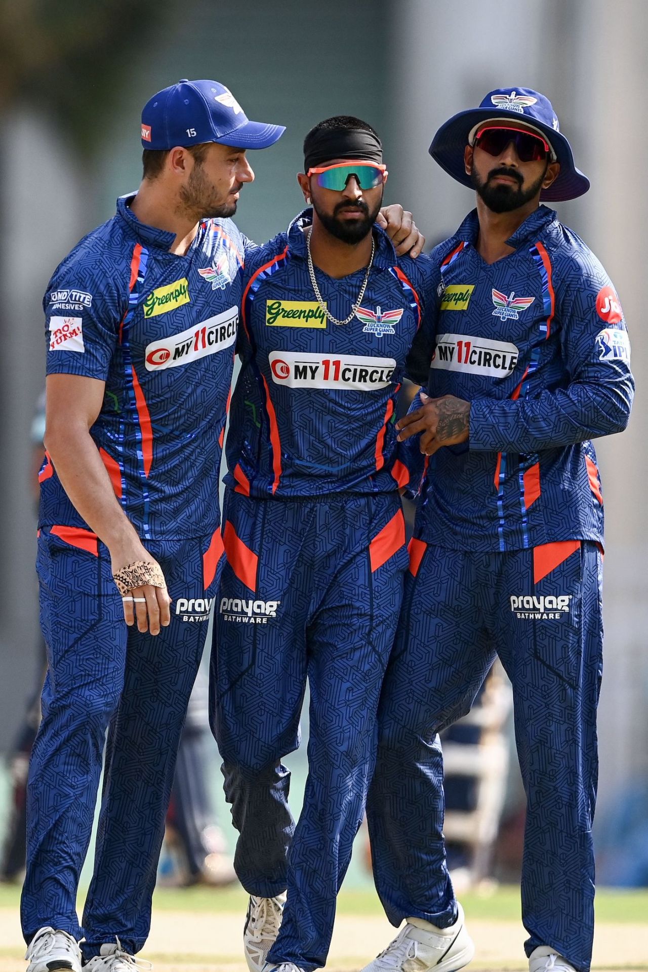 Marcus Stoinis, Krunal Pandya, and KL Rahul celebrate a wicket, Lucknow Super Giants vs Gujarat Titans, IPL 2023, Lucknow, April 22, 2023