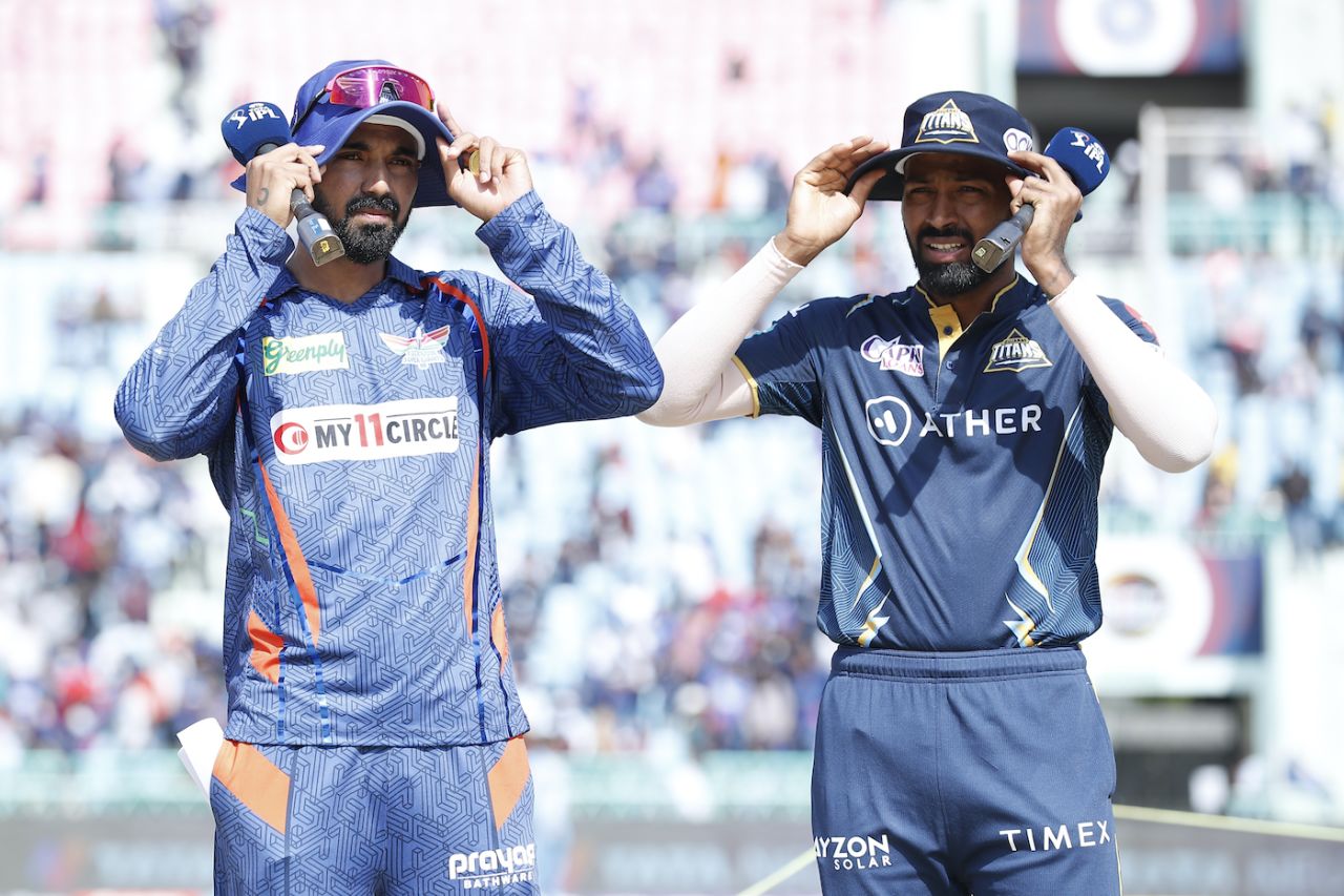 KL Rahul and Hardik Pandya look to shield themselves from the heat at the toss, Lucknow Super Giants vs Gujarat Titans, IPL 2023, Lucknow, April 22, 2023