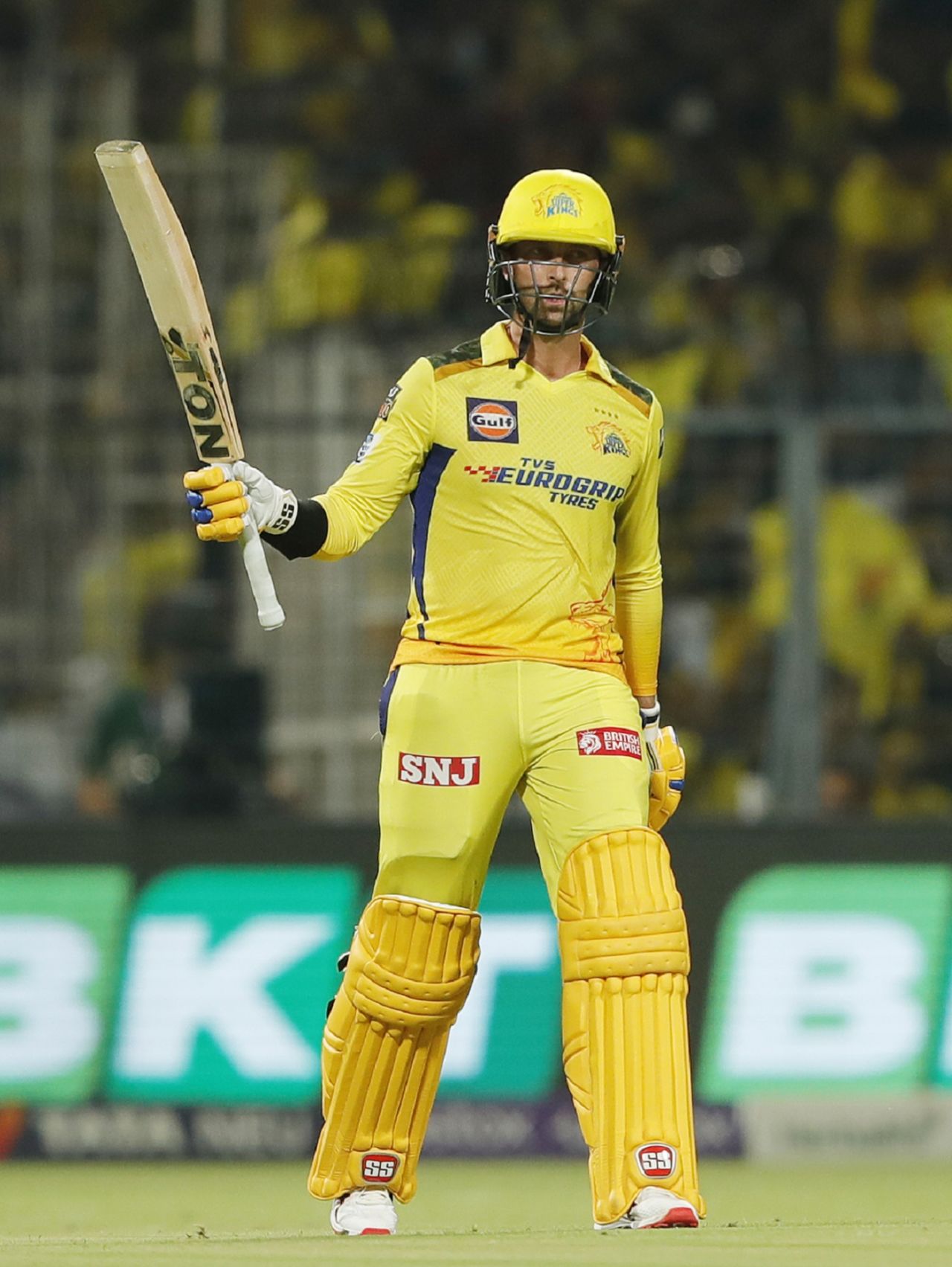 Devon Conway raises his bat after notching up another half-century, Kolkata Knight Riders vs Chennai Super Kings, IPL 2023, Kolkata, April 23, 2023