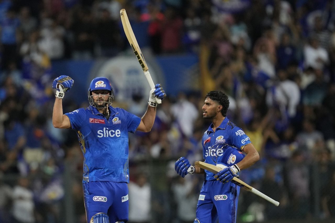 Tim David and Tilak Varma celebrate after the win, Mumbai Indians vs Rajasthan Royals, IPL 2023, Mumbai, April 30, 2023