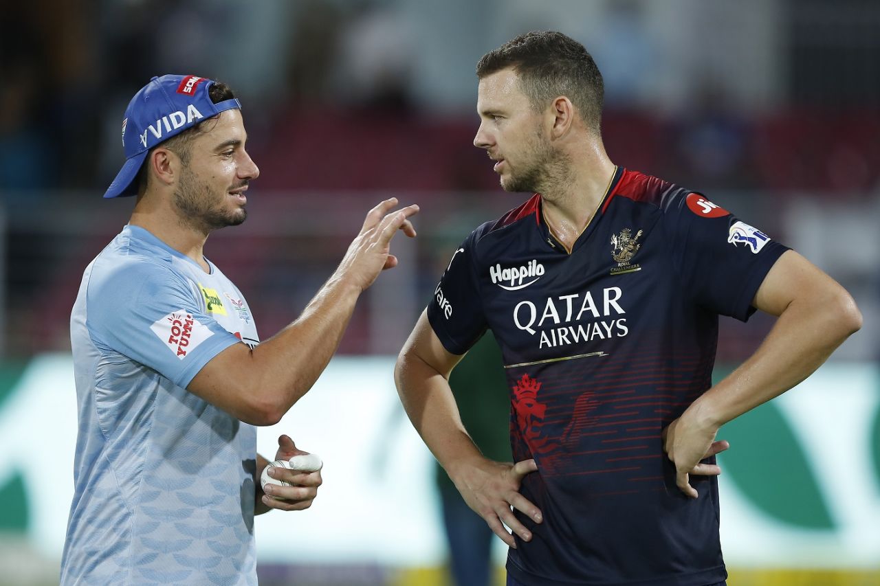 Marcus Stoinis and Josh Hazlewood have a chat before the contest, Lucknow Super Giants v Royal Challengers Bangalore, IPL 2023, Lucknow, May 1, 2023