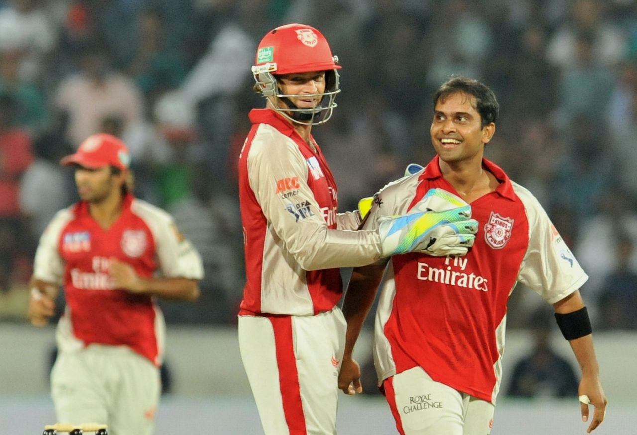 Paul Valthaty gets a hug from Adam Gilchrist after dismissing Amit Mishra for a duck, Deccan Chargers v Kings XI Punjab, April 16, 2011