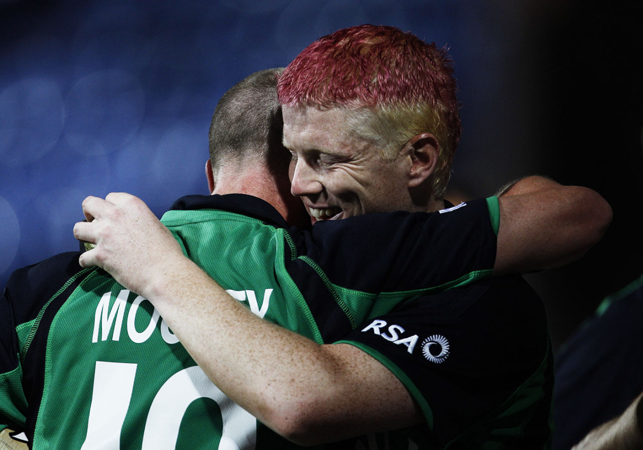 John Mooney hugs Kevin O'Brien after Ireland's win over England, England v Ireland, World Cup 2011, Bangalore, March 2, 2011