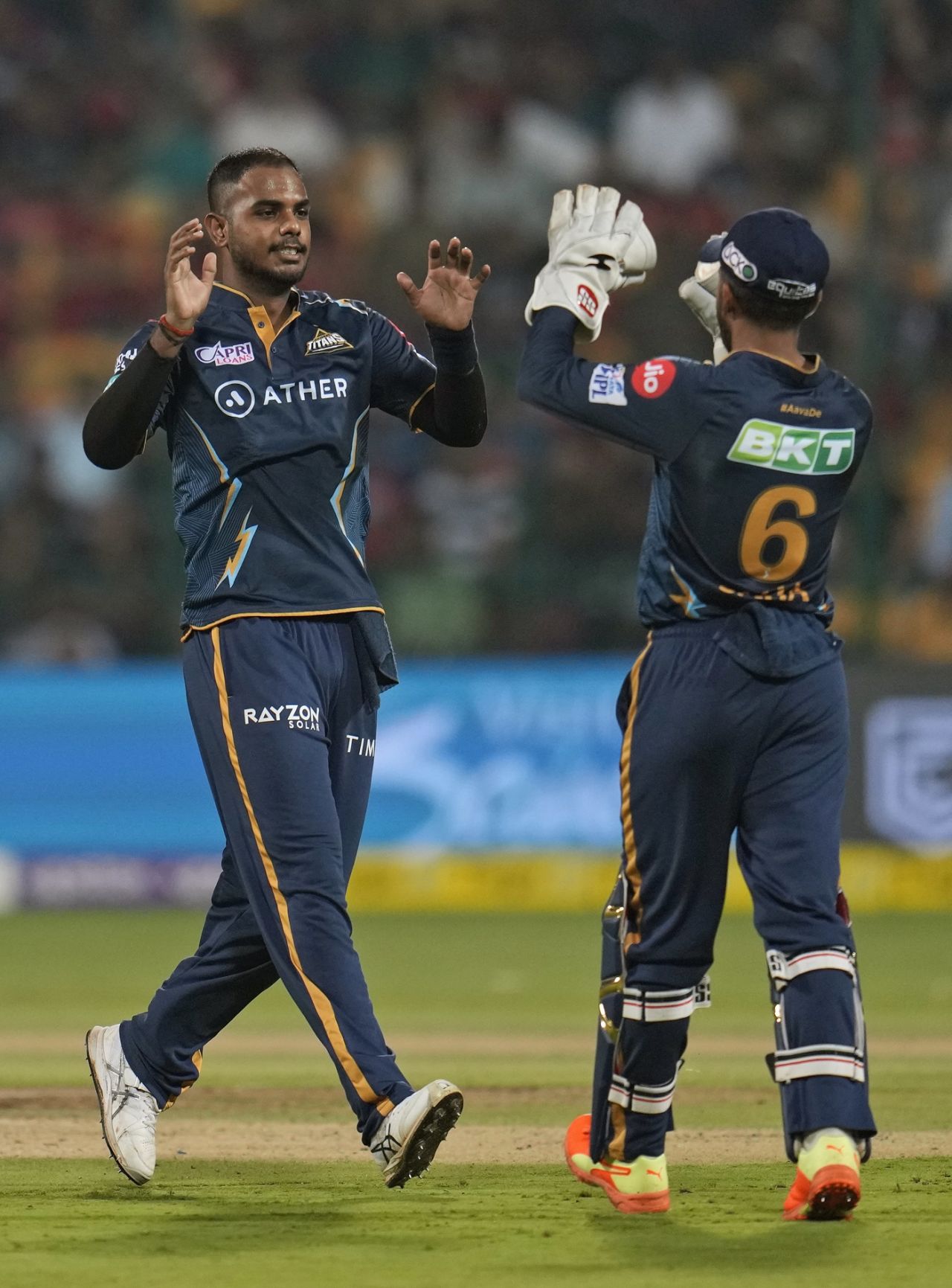 Yash Dayal and Wriddhiman Saha get together after the wicket of Dinesh Karthik, Royal Challengers Bangalore vs Gujarat Titans, IPL 2023, Bengaluru, May 21, 2023