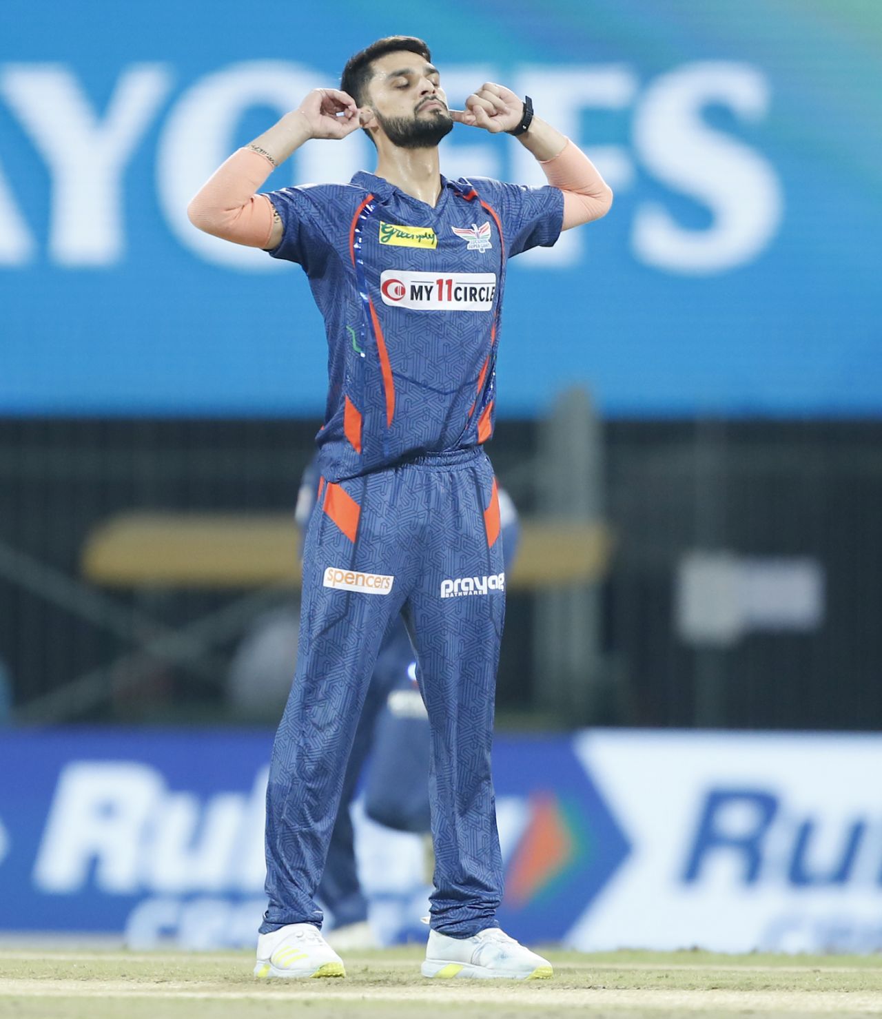 Shutting out the noise - Naveen-ul-Haq celebrates Rohit Sharma's wicket, Lucknow Super Giants vs Mumbai Indians, IPL 2023 Eliminator, May 24, 2023