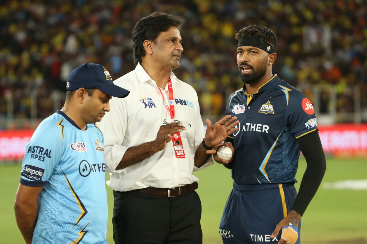 Match referee Javagal Srinath has a chat with Hardik Pandya as everyone waits for the field to dry, Chennai Super Kings vs Gujarat Titans, IPL 2023 final, Ahmedabad, May 29, 2023
