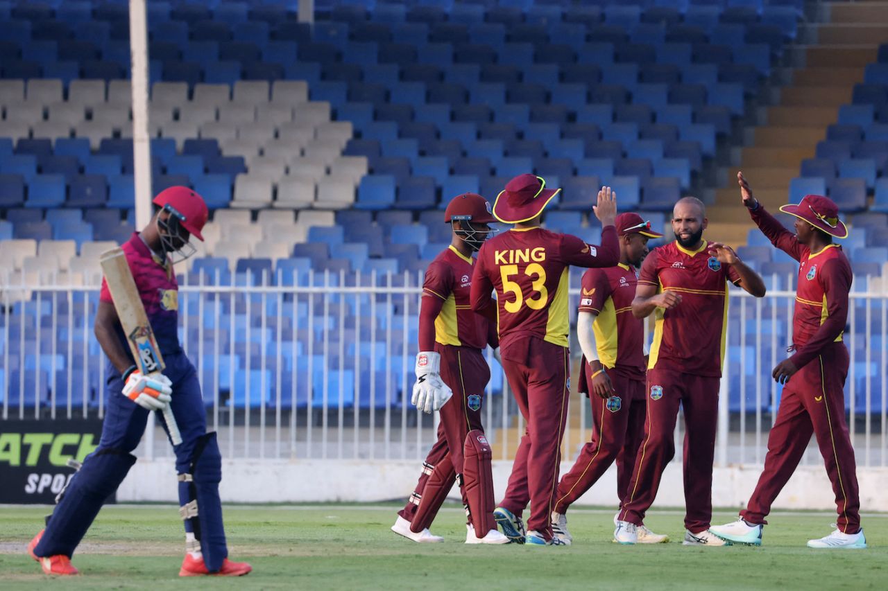 Yannic Cariah and Co celebrate the wicket of Vriitya Aravind, UAE vs West Indies, 1st ODI, Sharjah, June 4, 2023