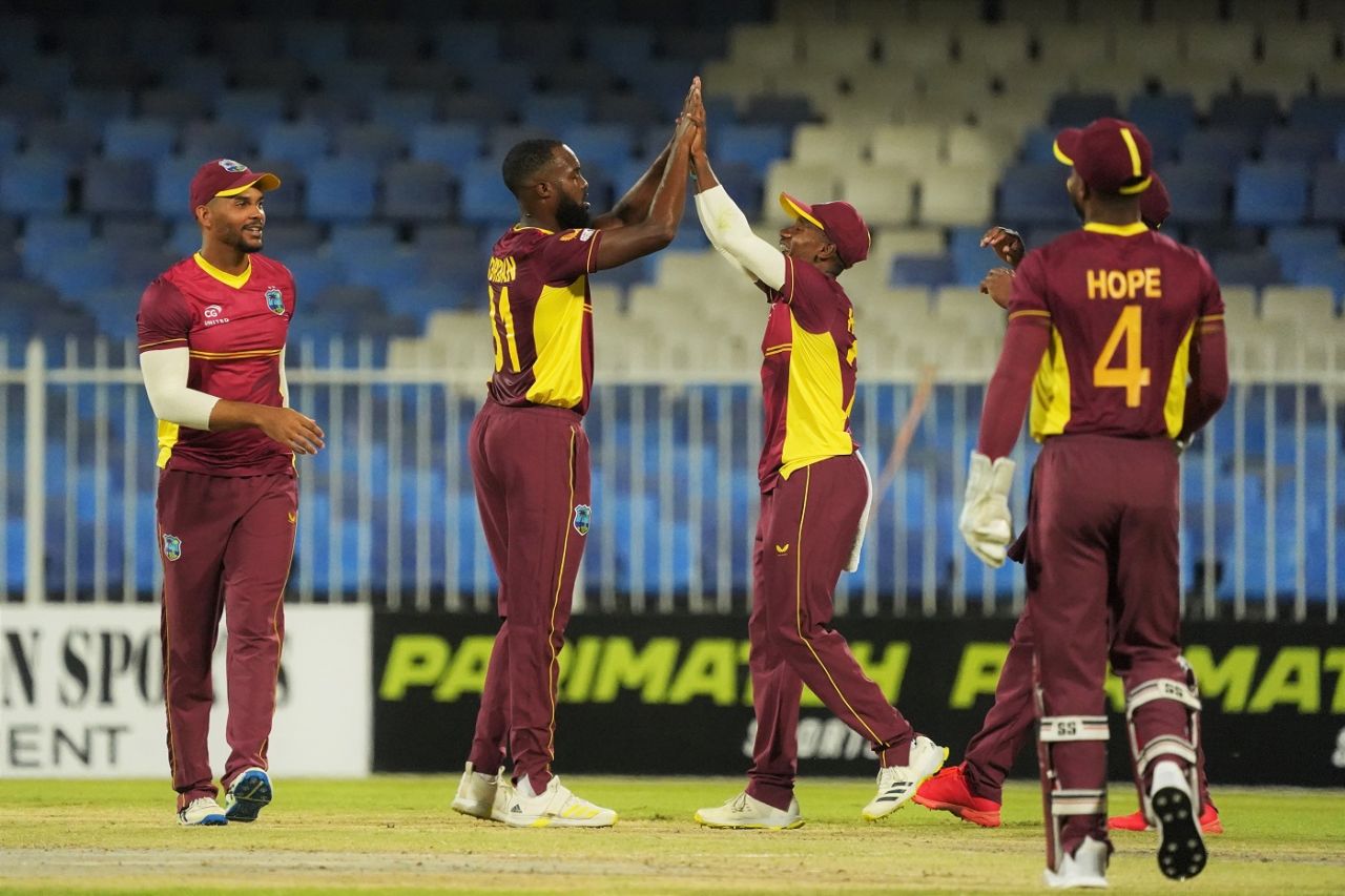 Akeem Jordan celebrates with team-mates on getting Muhammad Waseem, UAE vs West Indies, 2nd ODI, Sharjah, June 6, 2023