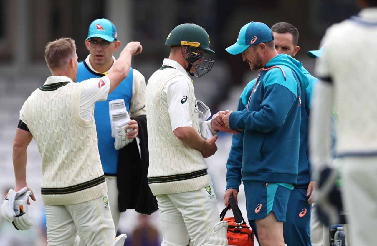 Marnus Labuschagne has his hand checked by medical staff after being struck , WTC final, day one, London, June 7, 2023
