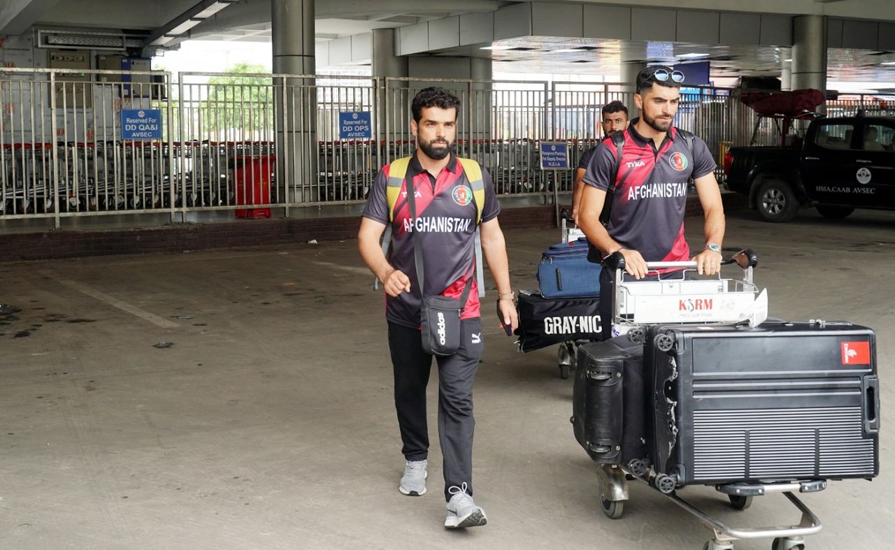 Ibrahim Zadran pushes his luggage out of the airport, Dhaka, June 10, 2023