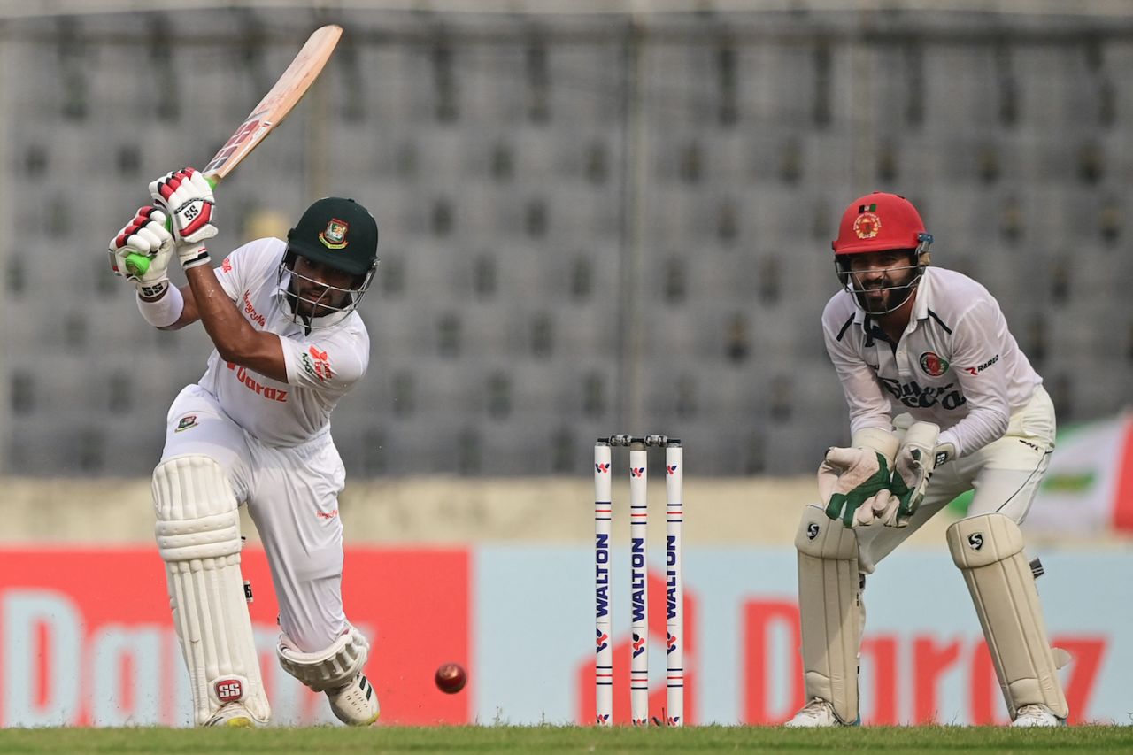 Zakir Hasan drives as Afsar Zazai watches, Bangladesh vs Afghanistan, Only Test, Mirpur, 2nd day, June 15, 2023